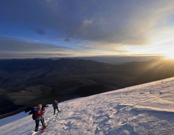 A breathtaking sunrise as the Mountaineers approach the summit of Kangyatse 2.