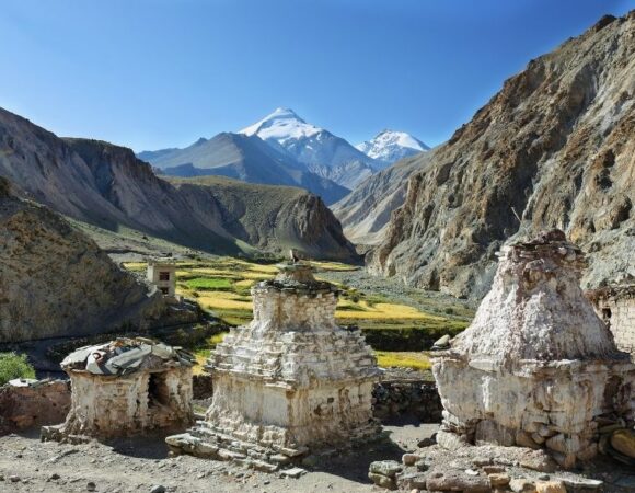 A breathtaking view of the Markha Valley, surrounded by towering Himalayan peaks.