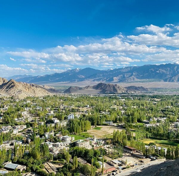 Clear blue skies and rugged landscapes in Ladakh during summer.