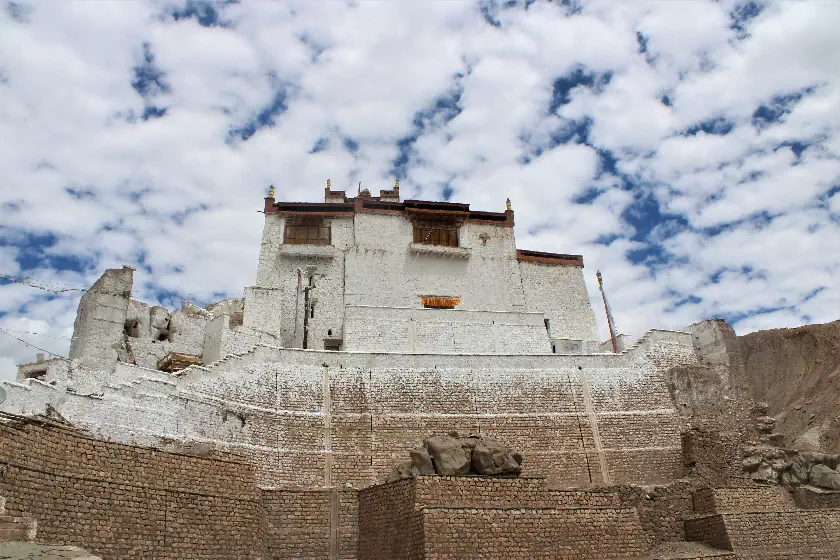 Basgo Monastery in Ladakh with murals and Buddha statues looking over the Indus Valley.